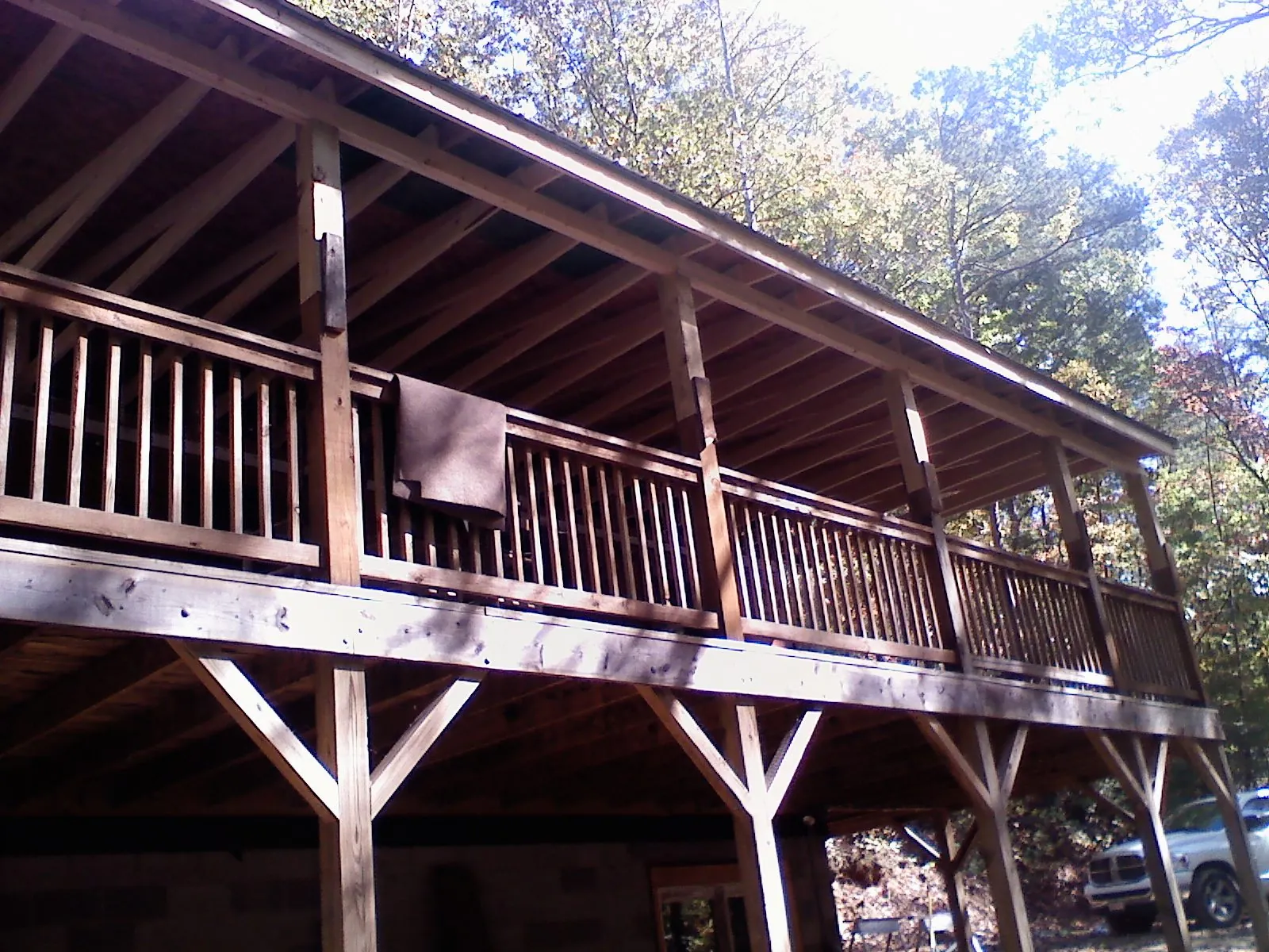 Timber framing under a new elevated porch and deck — Roof Leak Repair in Paradise by Roofing Brothers